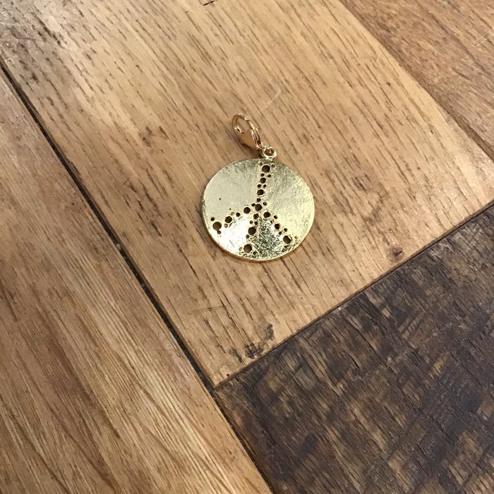Gold Laser Punch Peace Charm